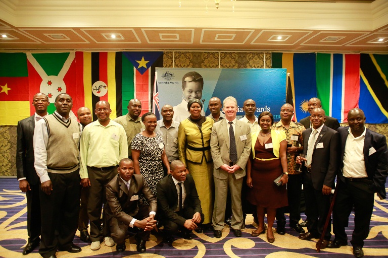 High Commissioner HE Geoff Tooth (centre), High Commissioner HE Dr Batilda S Burian, and Australia Award recipients from Tanzania